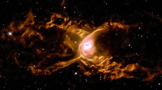 Hubble Spins a Web Into a Giant Red Spider Nebula