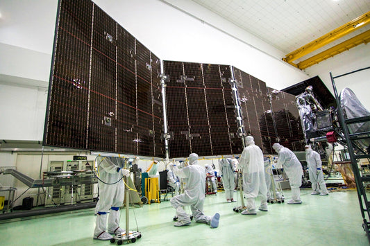 Technicians stow for launch solar array #2 for NASA Juno spacecraft