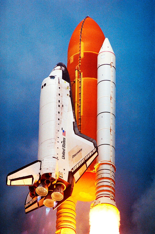 The Space Shuttle Discovery soars from Launch Pad 39A