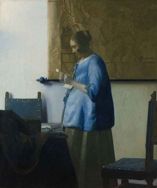 Woman Reading a Letter (ca. 1663) by Johannes Vermeer
